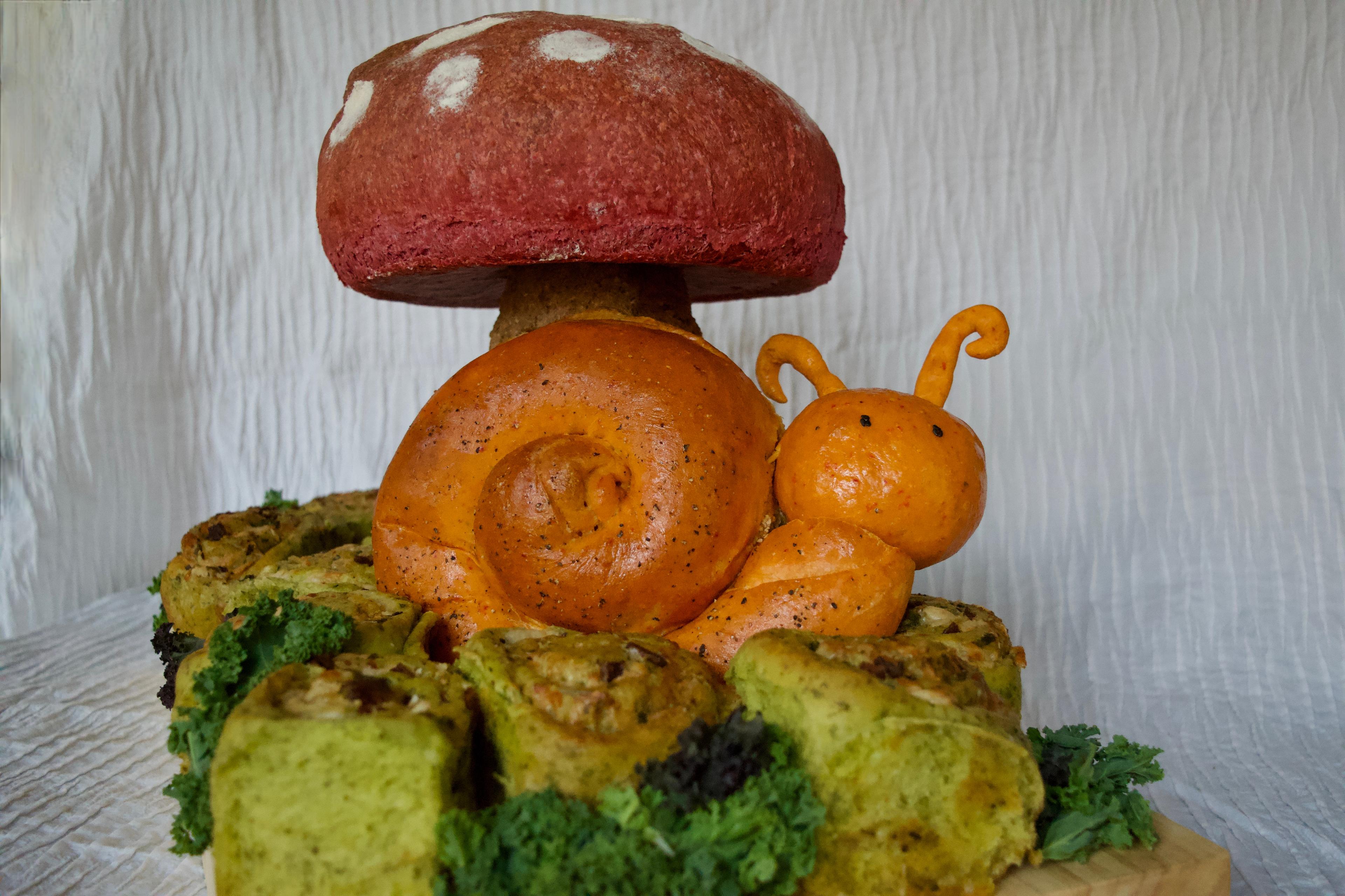 Completed bread sculpture looking at the snail head on