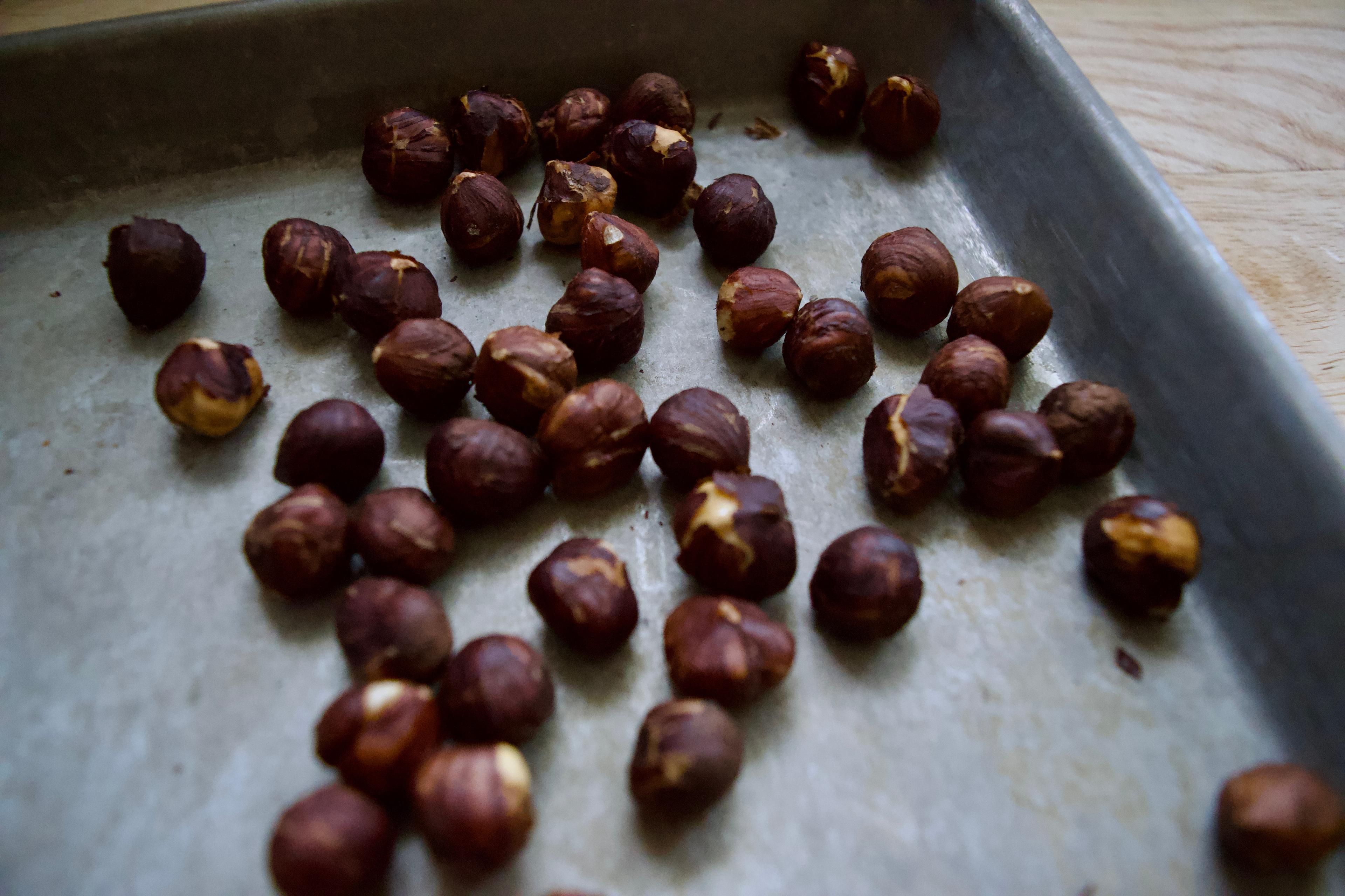 A tray of toasted hazelnuts